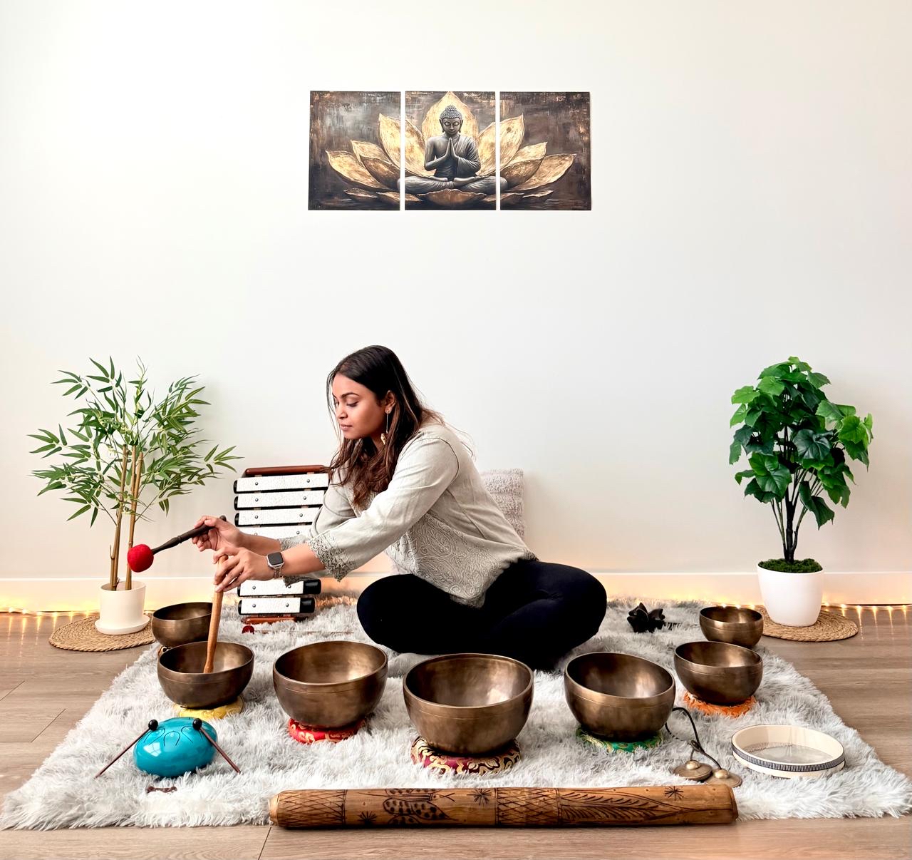 Nishi playing singing bowls