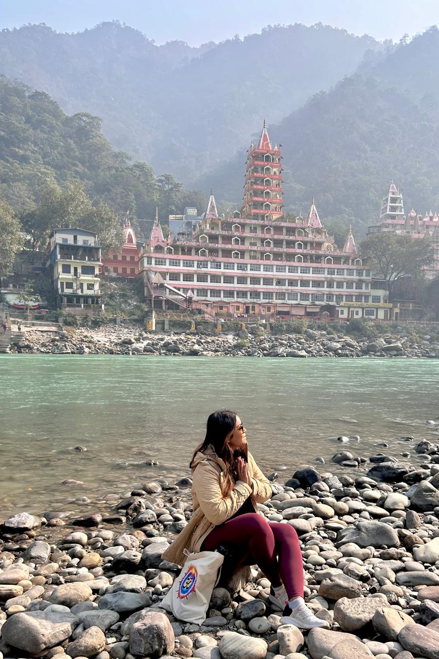 Nishi meditating by the Ganges river